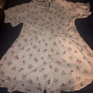 White and multi color shorts Romper